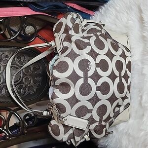 #20. Coach brown and cream bag